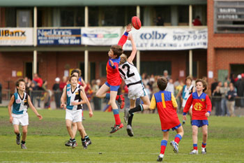 An action shot from the 2004 under 11 gold Grand Final.
